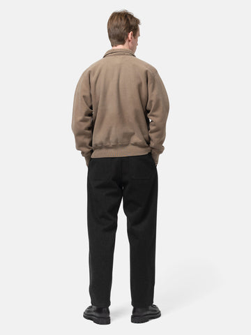 Rear view of the Model standing in studio wearing the A.PRESSE Vintage Half Zip Sweatshirt in Brown
