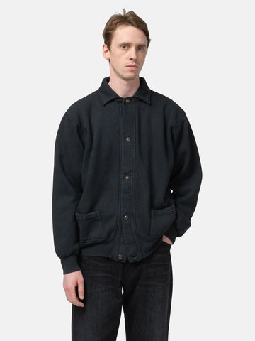 Half body shot of the model standing in studio wearing the A.PRESSE Vintage Sweat Cardigan in Black