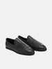 Three-quarter view of the AURALEE Soft Leather Loafers in Black
