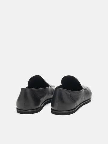 Back view of the AURALEE Soft Leather Loafers in Black