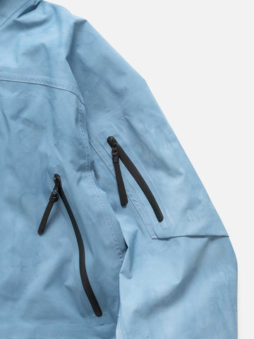 Details of the arm pocket of the Spectre Jacket in GORE-TEX 3L Nylon Hand Dyed Indigo