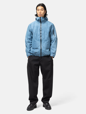 shot of the Model wearing the Spectre Jacket in GORE-TEX 3L Nylon Hand Dyed Indigo