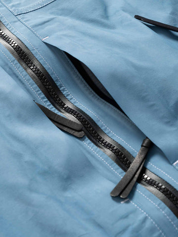 Details of the pocket of the Spectre Jacket in GORE-TEX 3L Nylon Hand Dyed Indigo