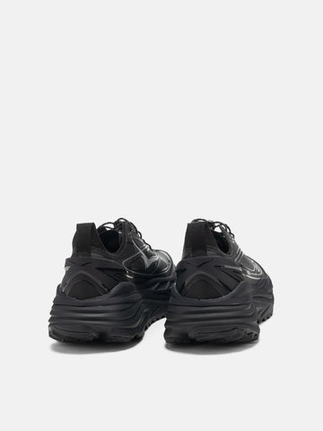 rear view of the HOKA Stinson One7 Black / Silver