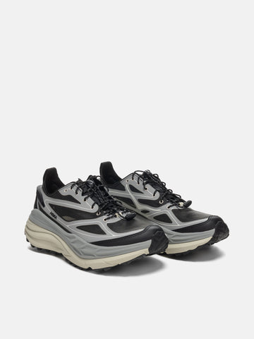 three quarter view of the HOKA Stinson One7 Stellar Grey / Eggshell