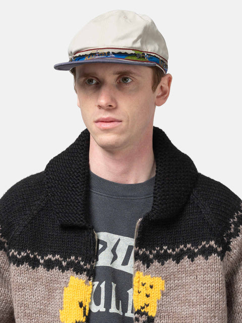 Model wearing the KAPITAL Chino BRIMFIELD Cap (Guiding Light) ECRxNavy
