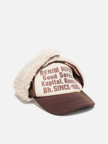 Flat shot of the KAPITAL DENIM REPAIR SERVICE LUMBER Trucker Cap ECTxBrwn