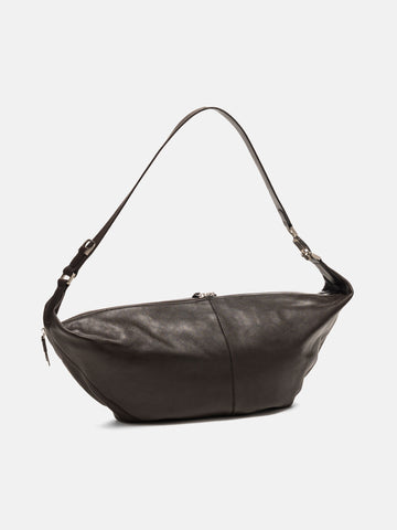 Three quarter view of the LEMAIRE Quiver Clip Bag Dark Chocolate