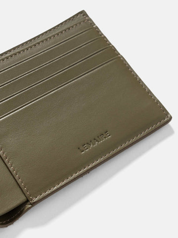 Close up of the inside of the LEMAIRE Soft Tab Bifold Velvet Moss