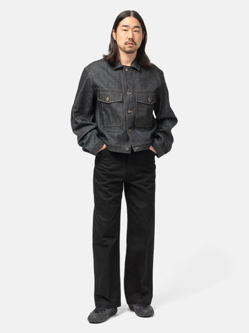 Full-body view of the model wearing the LEMAIRE Wide Pants Black