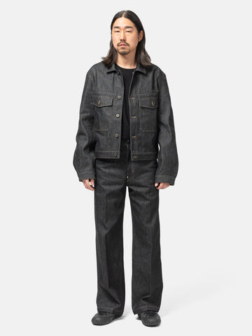 Full-body view of the model wearing the LEMAIRE Wide Pants With Studs Slate