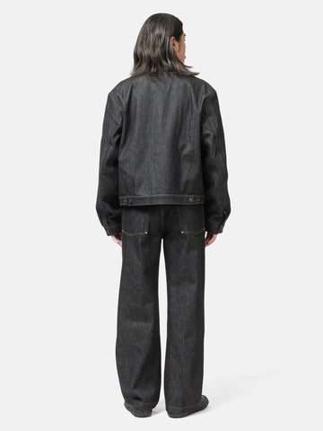 Rear view of the model wearing the LEMAIRE Wide Pants With Studs Slate