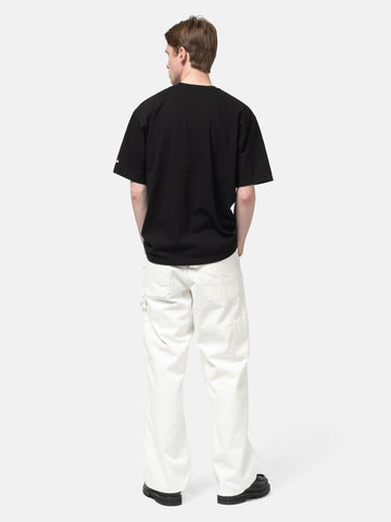 Rear view of model wearing the NEIGHBORHOOD NH Tee SS-2 Black