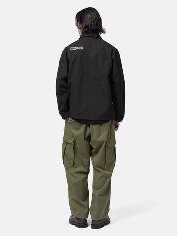 Back shot of the model wearing the  Neighborhood Fatigue Shirt LS Black