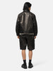 Back shot of the model wearing the Neighborhood Leather Sports Jacket Black