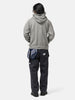 Back of the model wearing the Neighborhood Pigment Dyed Sweat Hoodie LS Gray