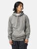 Half body shot of the model wearing the Neighborhood Pigment Dyed Sweat Hoodie LS Gray