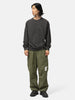 Full body shot of the model wearing the Neighborhood Pigment Dyed Sweat Shirt LS Black