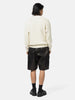Back of the model wearing the Neighborhood Savage Crewneck Sweater White