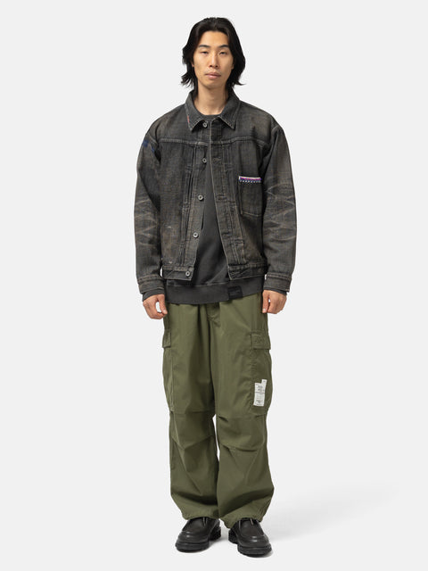 Full body shot of the model wearing the Neighborhood Savage Denim Type-1 Jacket Black