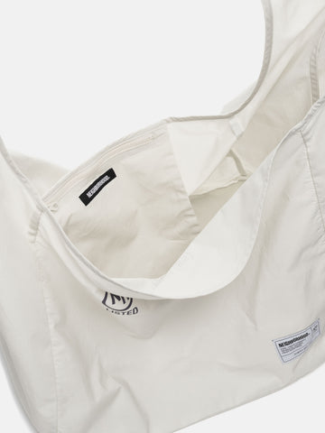 Inside details shot of the Neighborhood Solid Newspaper Bag Ivory