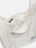 Inside details shot of the Neighborhood Solid Newspaper Bag Ivory