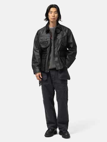 Full body shot of the model wearing the Neighborhood Tool Pocket Utility Pants Black