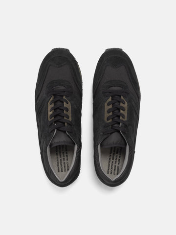 Top view of the Reproduction of Found British Military Trainer in Black premium suede and nylon photographed in studio.