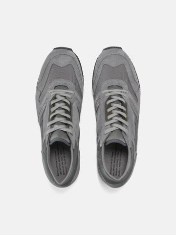 Top view of the Reproduction of Found British Military Trainer in Grey premium suede and nylon photographed in studio.