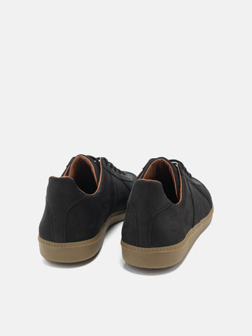 Rear  view of the Reproduction of Found German Military Trainer in black Italian suede and Nappa leather photographed in studio.