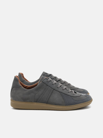 Side view of the Reproduction of Found German Military Trainer in dark grey Italian suede and Nappa leather photographed in studio.