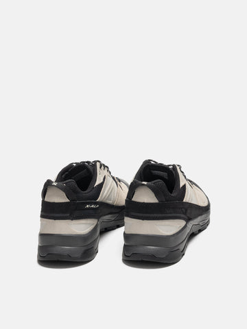 rear view of the Salomon X ALP LTR in Black and vanilla ice 