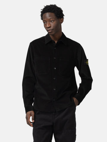 Half body shot of the model wearing the Stone Island Cotton Micro-Corduroy Overshirt Black