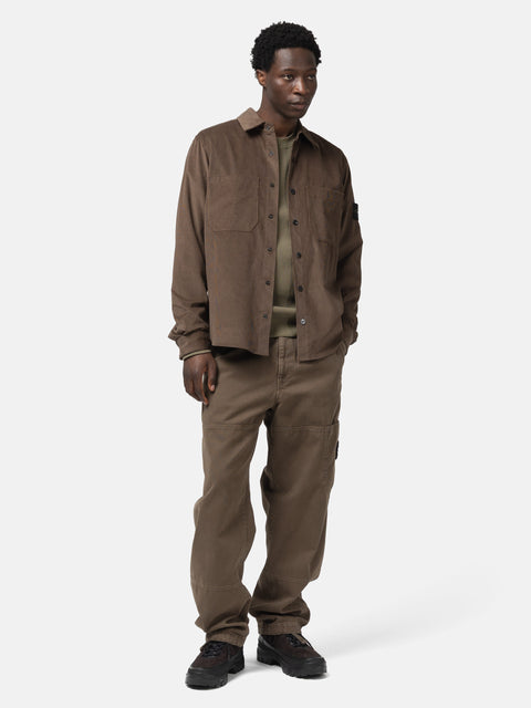 Full body shot of the model wearing the the Stone Island Cotton Micro-Corduroy Overshirt Umber