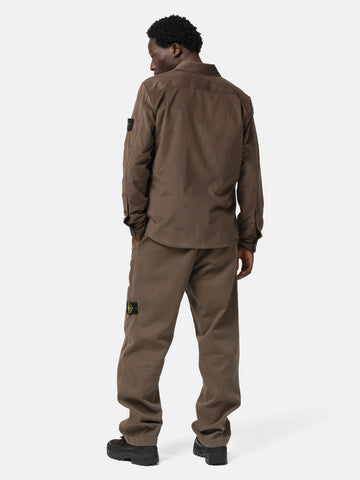 Back shot of the model wearing the Stone Island Cotton Micro-Corduroy Overshirt Umber