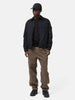 Full body shot of the model wearing the Stone Island Ghost Piece All-Weather Cotton Canvas Overshirt Black