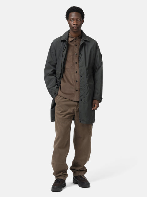 Full body shot of the model wearing the Stone Island Light Compact Touch Poly-TC Car Coat Charcoal Grey