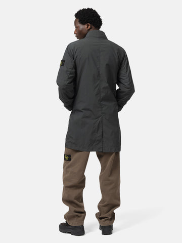 Back shot of the model wearing the Stone Island Light Compact Touch Poly-TC Car Coat Charcoal Grey