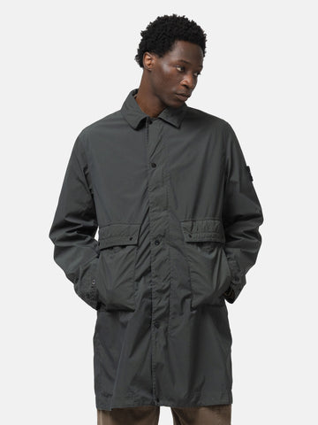Half body shot of the model wearing the Stone Island Light Compact Touch Poly-TC Car Coat Charcoal Grey