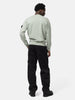 Back shot of the model wearing the Stone Island Organic Cotton Fleece Crewneck Sage