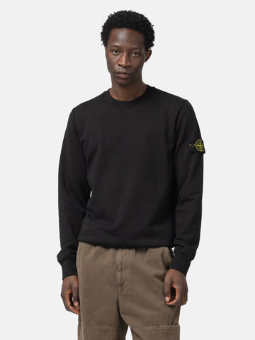 Half body shot of the model wearing the Stone Island Organic Cotton Fleece Crewneck Sweatshirt Black