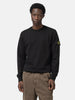 Half body shot of the model wearing the Stone Island Organic Cotton Fleece Crewneck Sweatshirt Black