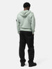 Back shot of the model wearing the Stone Island Organic Cotton Hooded Sweatshirt Sage