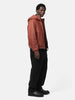 Side shot of the model wearing the Stone Island Organic Cotton Patch-Pocket Cargo Trouser Black