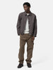Full body shot of the model wearing the Stone Island Organic Cotton Patch-Pocket Cargo Trouser Brown