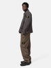 Side shot of the model wearing the Stone Island Organic Cotton Patch-Pocket Cargo Trouser Brown