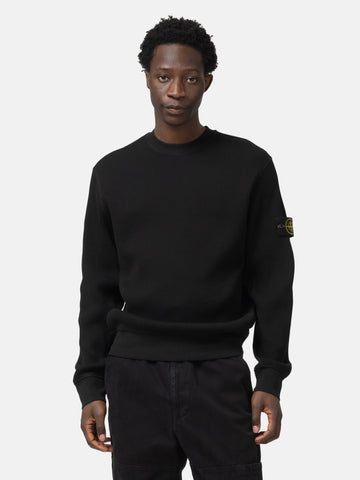 half body shot of the model wearing the Stone Island Organic Cotton Waffle Fleece Crewneck Black