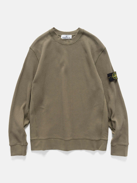 Flat shot of the Stone Island Organic Cotton Waffle Fleece Crewneck Military Green
