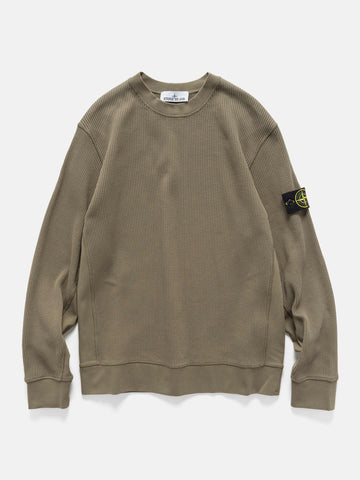Flat shot of the Stone Island Organic Cotton Waffle Fleece Crewneck Military Green