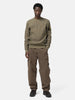 Full body shot of the model wearing the Stone Island Organic Cotton Waffle Fleece Crewneck Military Green